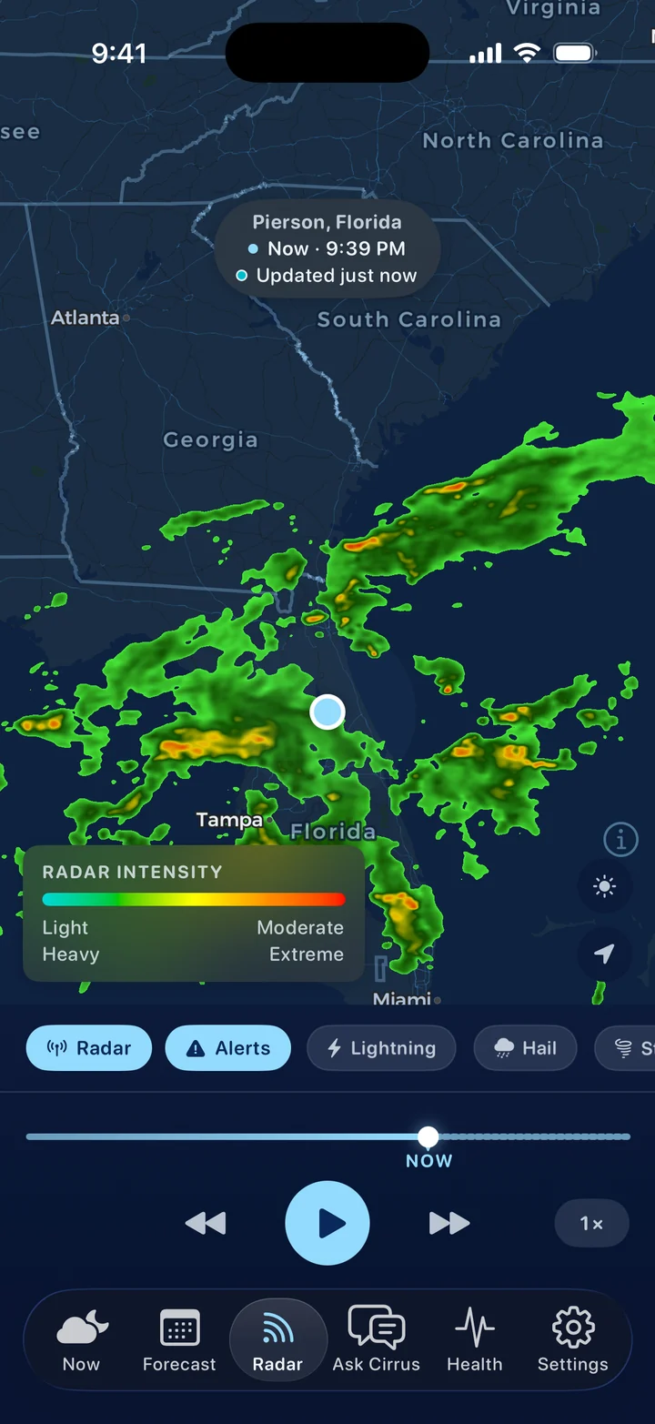 Cirrus’s radar at night: rain in green, yellow, and orange across Florida and Georgia with Atlanta and Tampa labeled, the Radar, Alerts, Lightning, and Hail layers, and the play bar at Now.